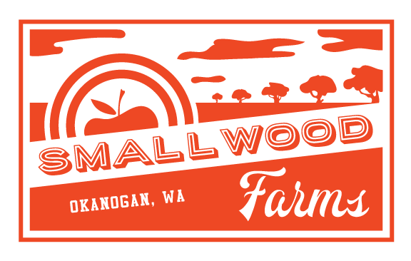 Logo of Smallwood Farms, located in Okanogan, WA, featuring a stylized apple and a rainbow design, emphasizing agricultural roots and local produce.